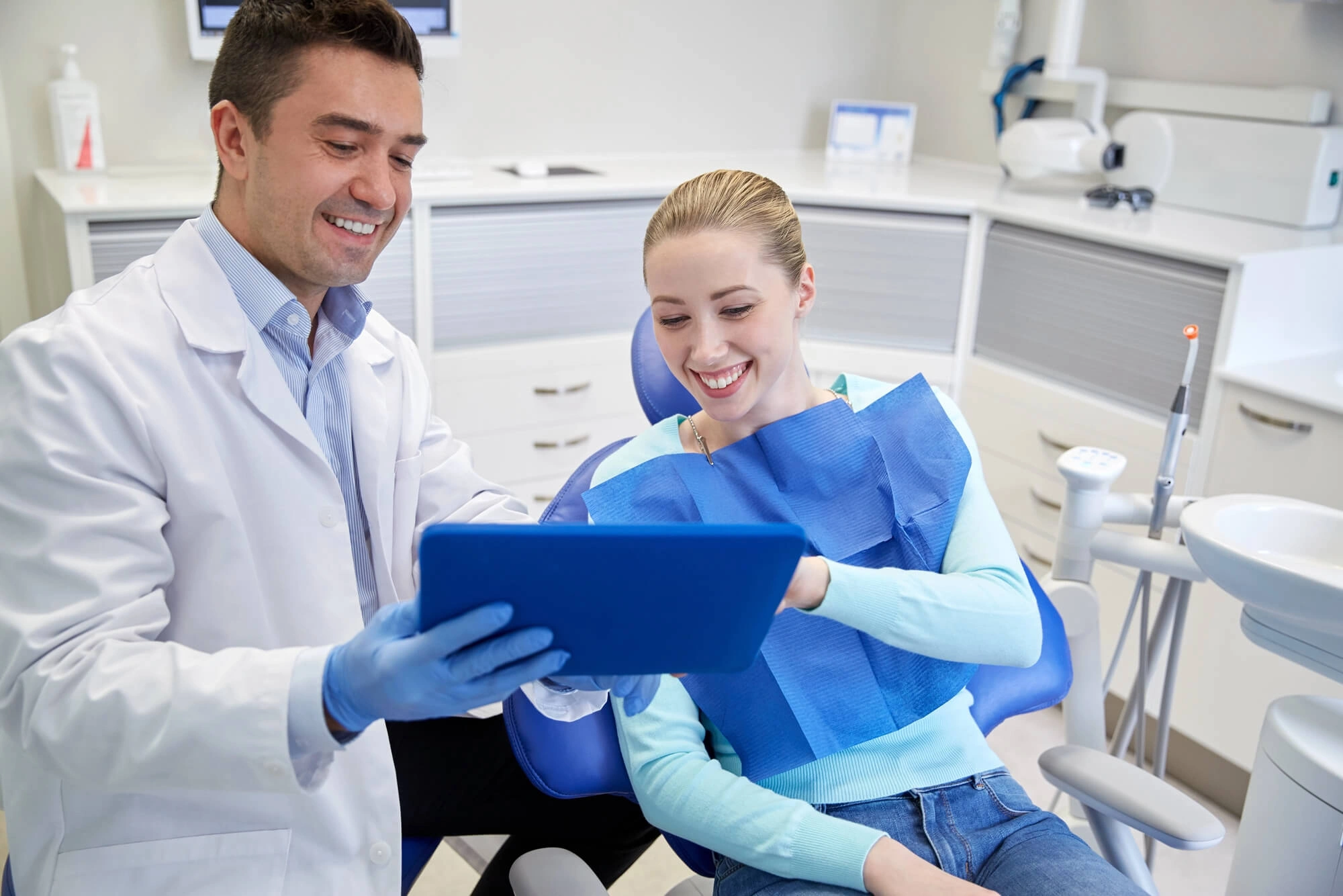 Girl-looking-at-her-tooth-xray-with-an-emergency-dentist-detroit