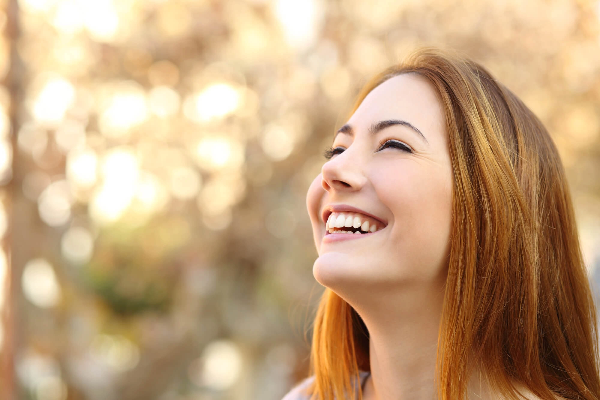 Girl-smiling-after-Teeth-whitening-Clawson