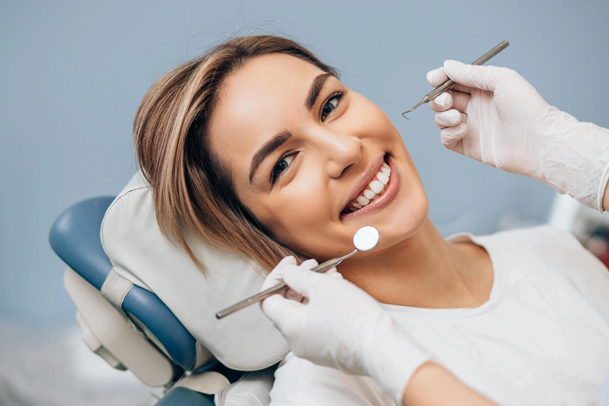 Girl-receiving-dental-cleaning-services