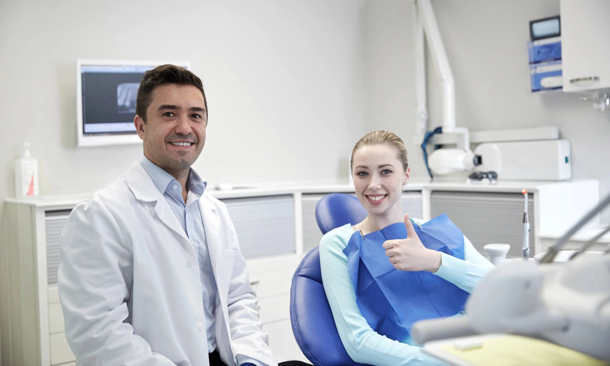Girl-undergoing-root-canal-treatment-by-dentist-clawson-mi