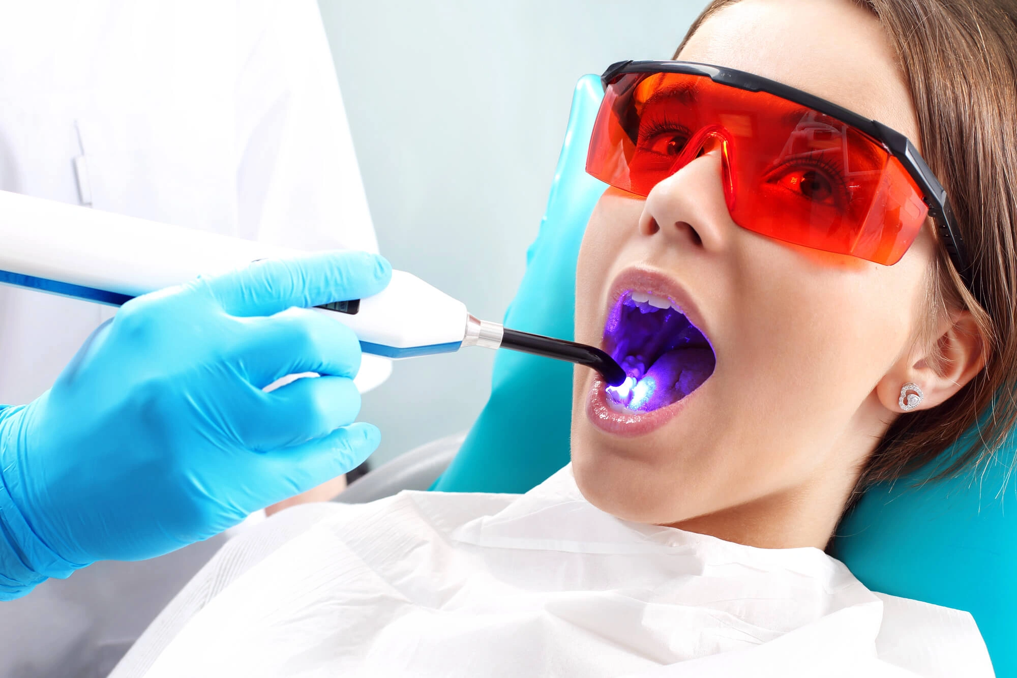 Woman undergoing affordable dental fillings clawson