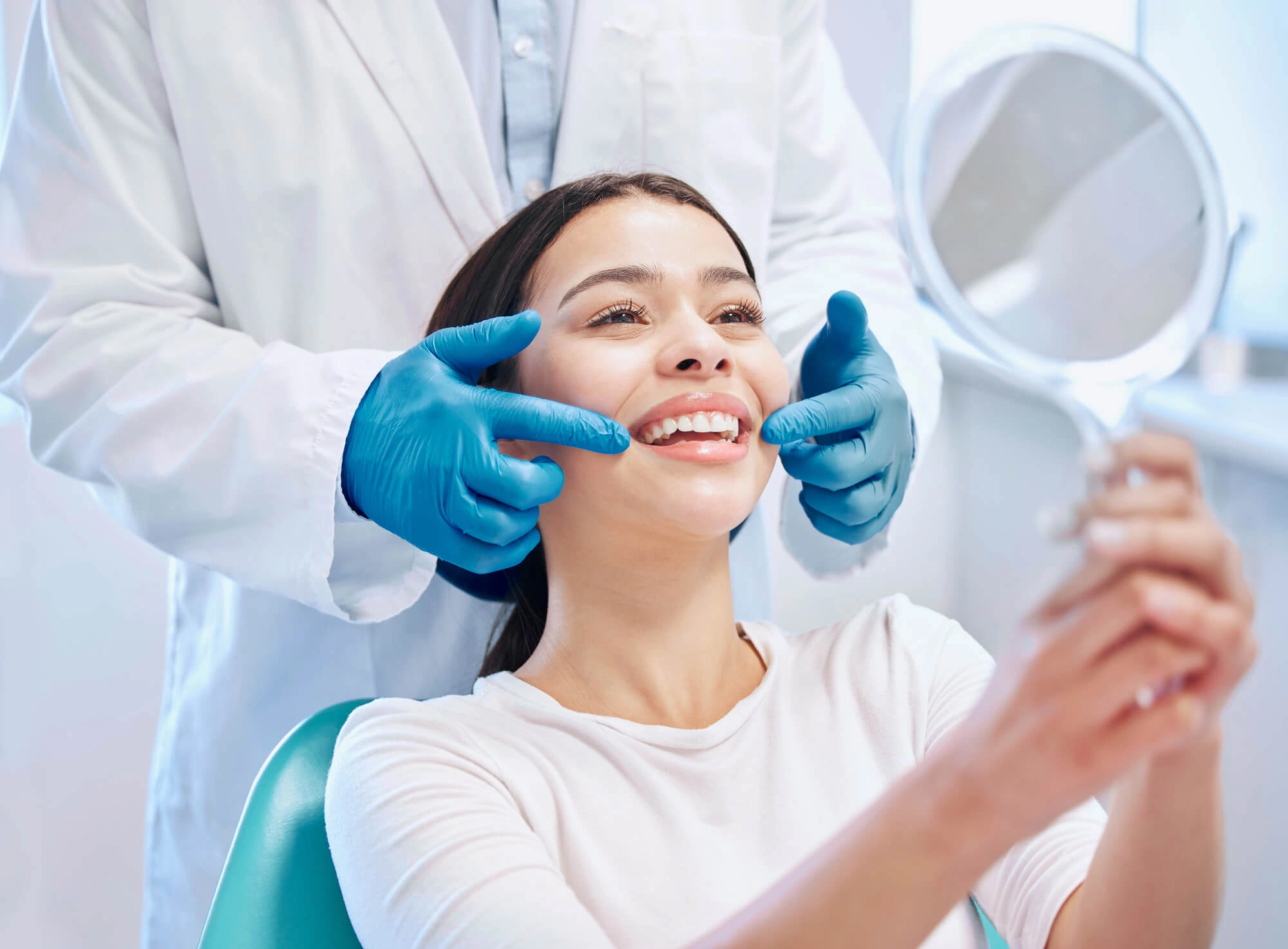 Woman smiling at dentist greenfield